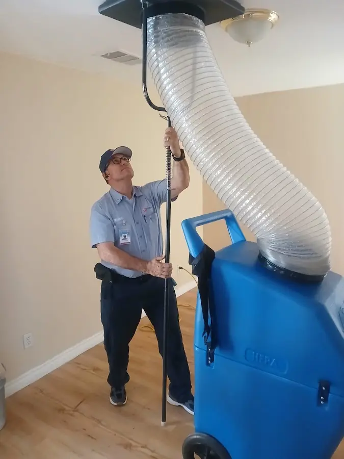 Mini Split Installation technician using HEPA equipment in Sterling